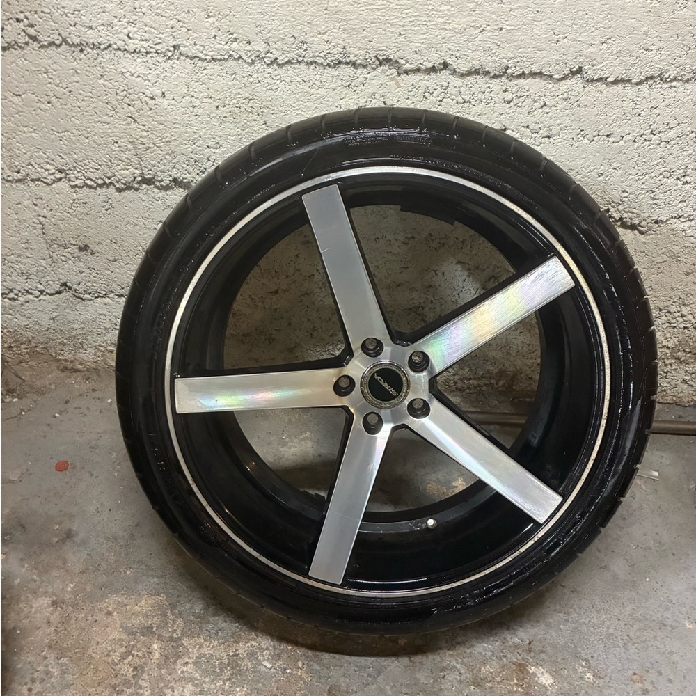 4  22” Silver and Black rims. 5 lug